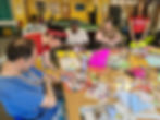 5 people working together at a table being creative from a Co-Creative Connection Workshop partnered with workshop partnered with Newham Council Learning Disabilities and Autism Adults Commissioning Team_, ADULTS & HEALTH (DASS)
