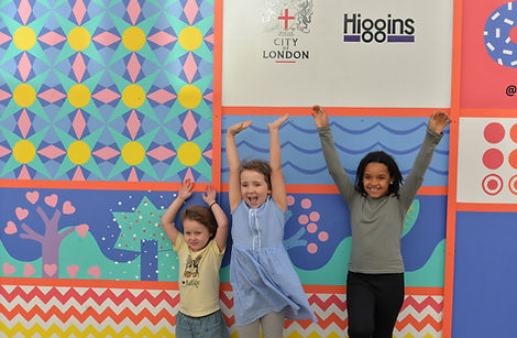 Co-Creative Connection Higgins Islington Summer Reveal (1). Children in front of mural.jpg