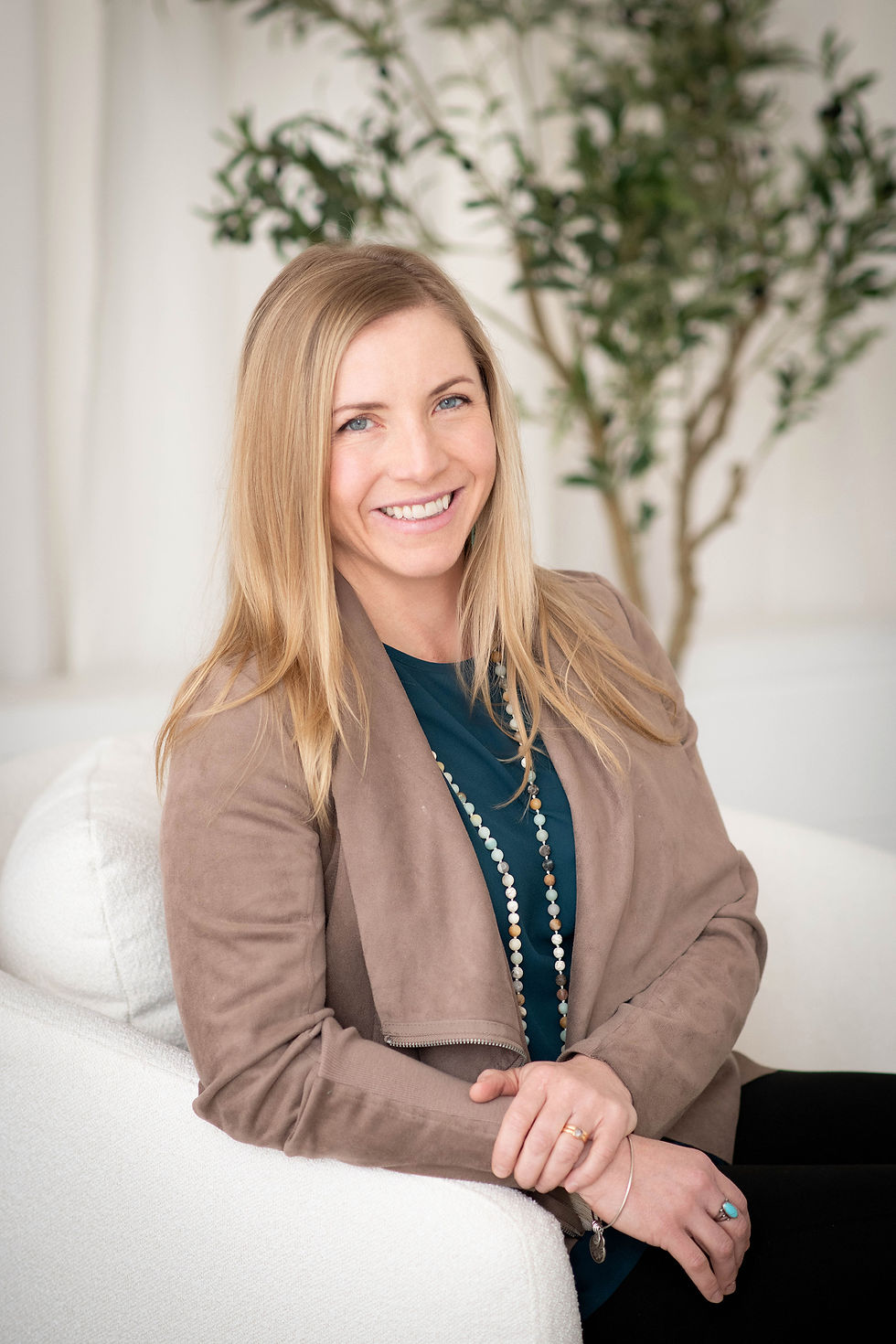 Jane Chevalier, licensed massage therapist and founder of Take Care Mama, providing prenatal, postpartum, and therapeutic care in Highlands Ranch.