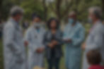 medical community camp in park, diversity doctors helping people with 1 black female and 4