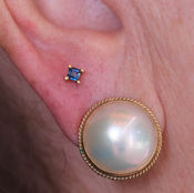 second earlobe piercing with yellow gold sapphire bvla jewelry and anatometal titanium