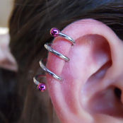 Triple Spiral Helix piercing with anatometal titanium jewelry with pink anodized titanium beads