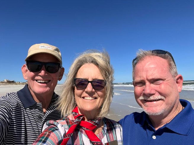 The author, right, visits Mike and Shann Purinton at Atlantic Beach in Jacksonville, Florida, on Oct. 17.
