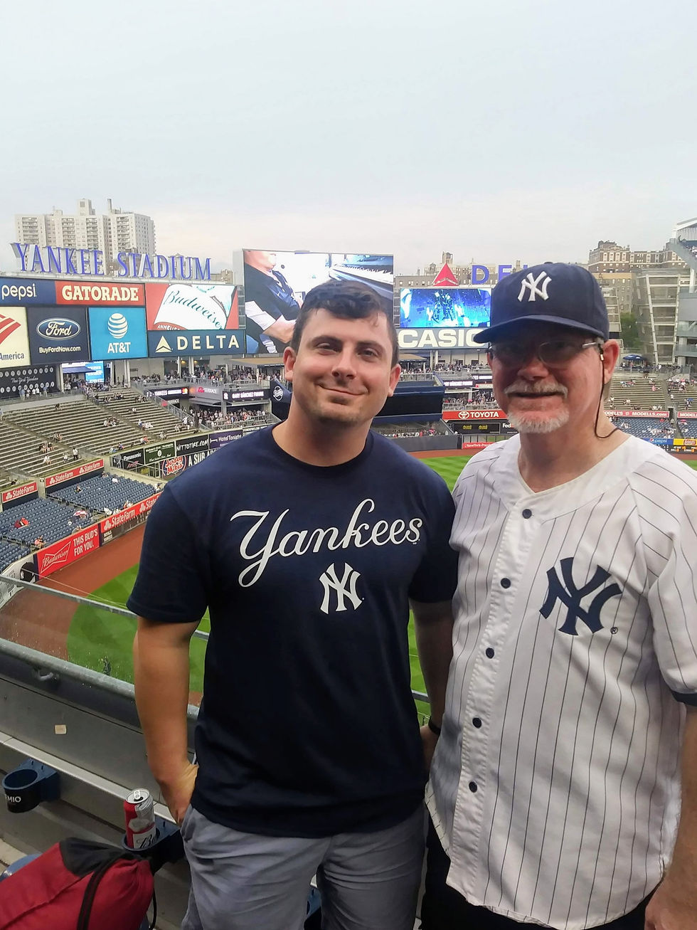Wayne Smith and his son, Alex, at Yankee Stadium in 2018—one of many stops along a shared baseball journey.