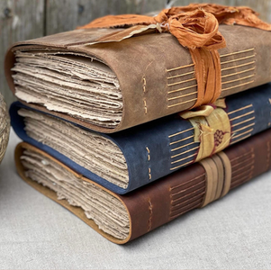 Handmade hemp paper leather journals Hypatia Book Arts