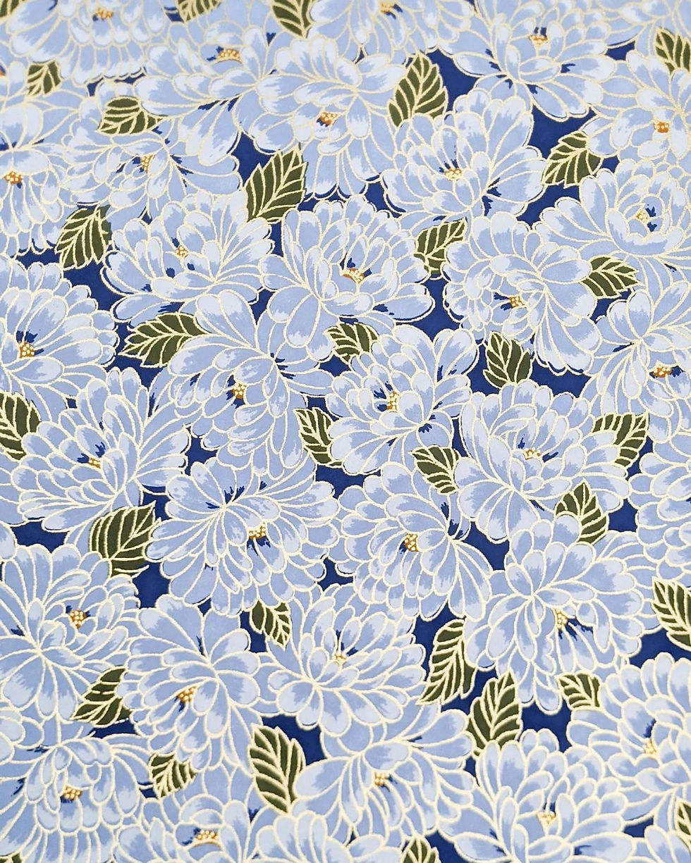 Thumbnail: blue lotus case binding book pattern detail