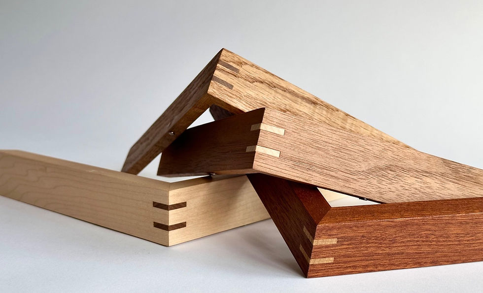 picture frames in diffrent hardwoods, walnut, maple, oak, sapele.