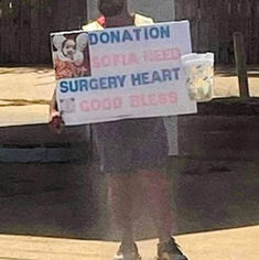 street scammer donation heart surgery.jpeg