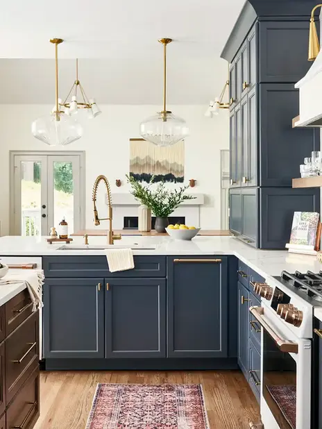 Bold and beautiful blue kosher kitchen interior design project by HouseLift Design | two sinks | entertaining kitchen | blue kitchen cabinets | wood kitchen island | two dishwashers | glass pendant lighting