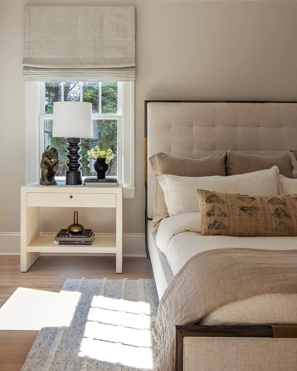 neutral bedroom | bedroom design | neutral master bedroom | organic modern | cream duvet | neutral window treatment | neutral area rug | neutral textured area rug | off white tufted headboard | cream tufted headboard | white oak floor | modern nightstand | white nightstand | bedroom decor | bedroom black table lamp | beige bed throw blanket | neutral bed throw blanket