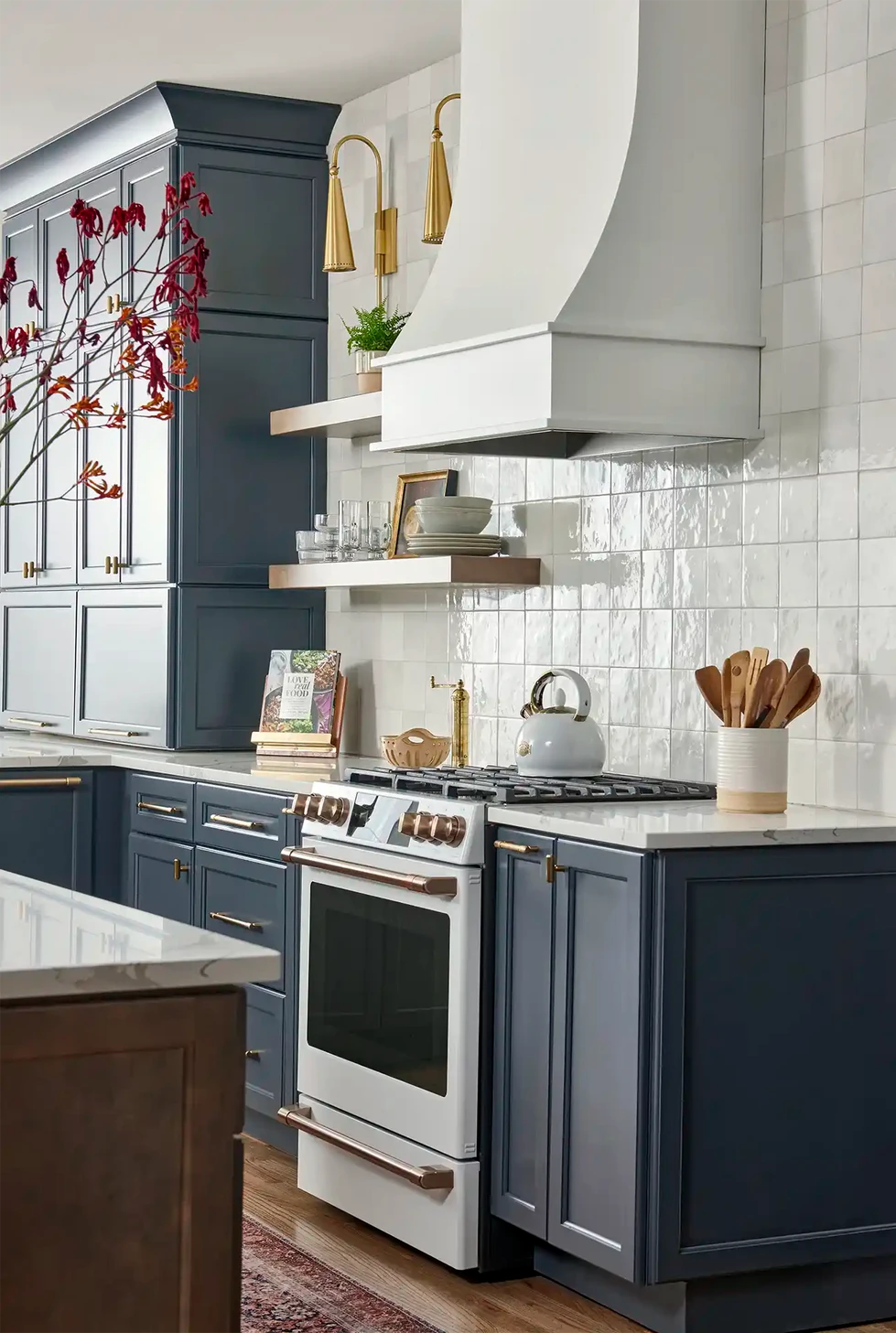Kosher kitchen renovation | dark blue kitchen cabinets | two kitchen sinks | kitchen island | kitchen glass pendant lights