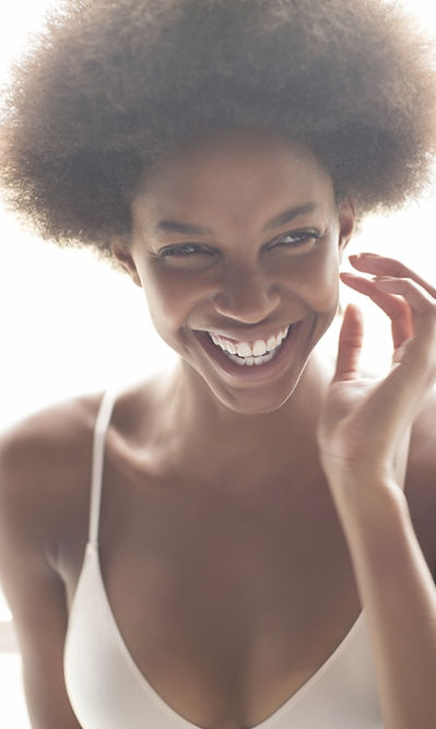 Adult voice student smiles with joy and ease
