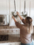 Learn how to hang mini wreaths on kitchen cabinet doors.