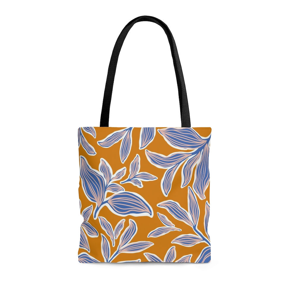 Orange tote bag with blue leaves and black handle on white background.