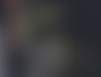 PHP code displayed on a computer screen; text in various colors on a dark background, indicating a programming or development setting.