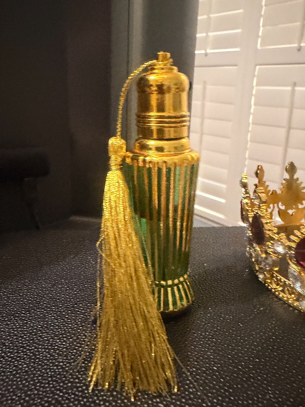 Thumbnail: Cathy's actual gold tassel bottle, complete stopper and base