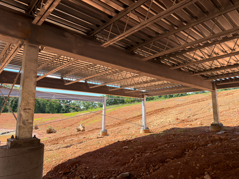 Galvanized Steel Structure over a Lake Edge featuring Custom Bar Joist, Beams, and Columns
