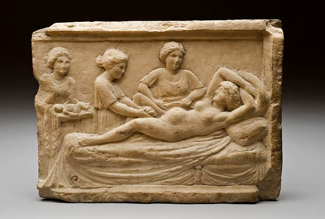 Ancient Roman relief sculpture depicting childbirth