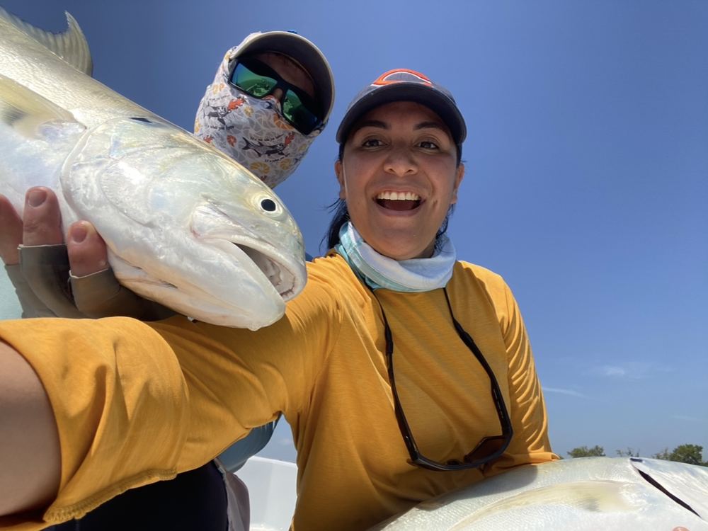 Anglers with a jack crevalle catch