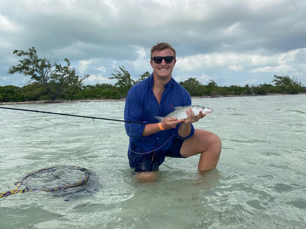 Two anglers fishing together in Belize