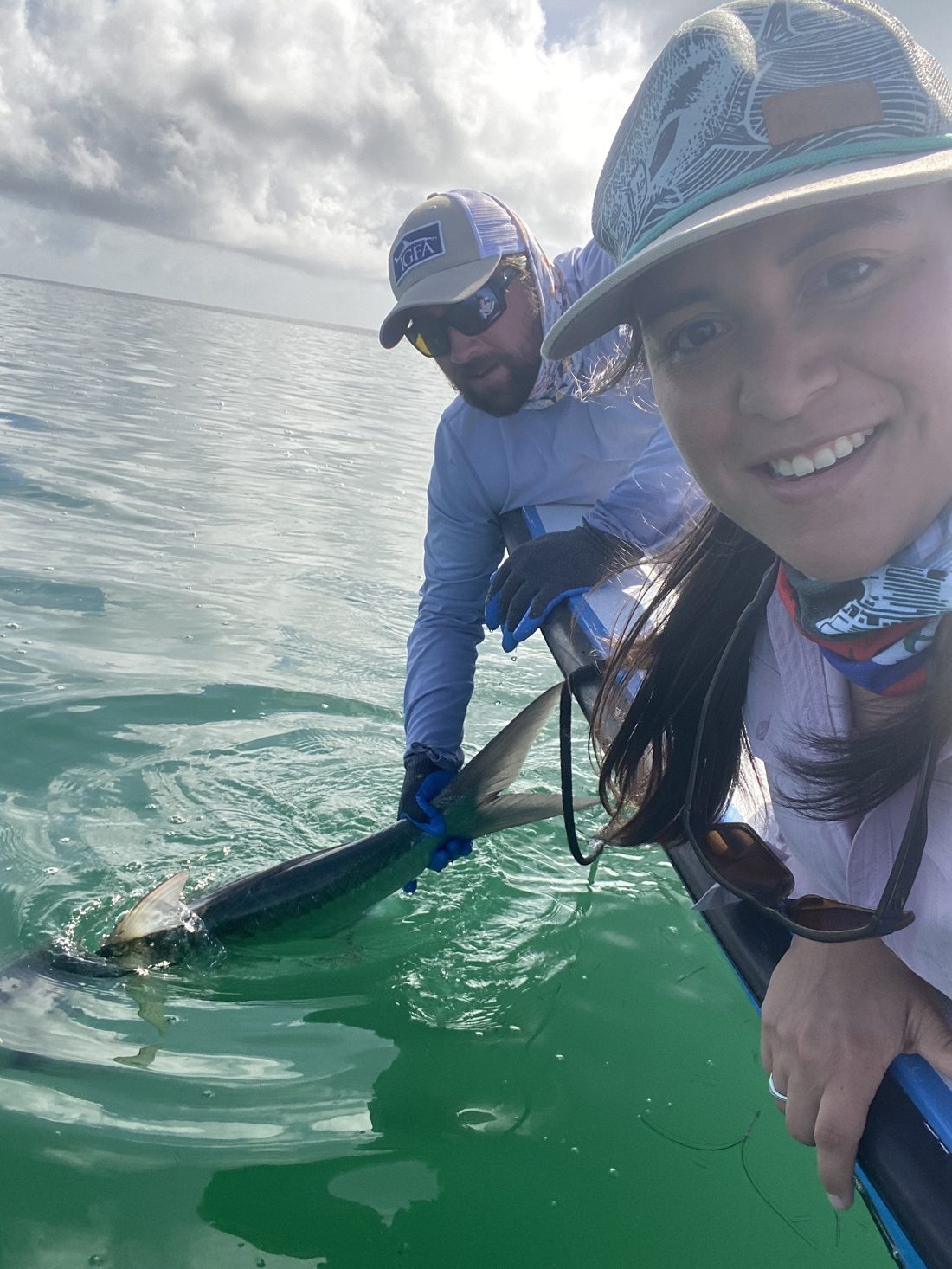 Will and Nissa releasing a tarpon