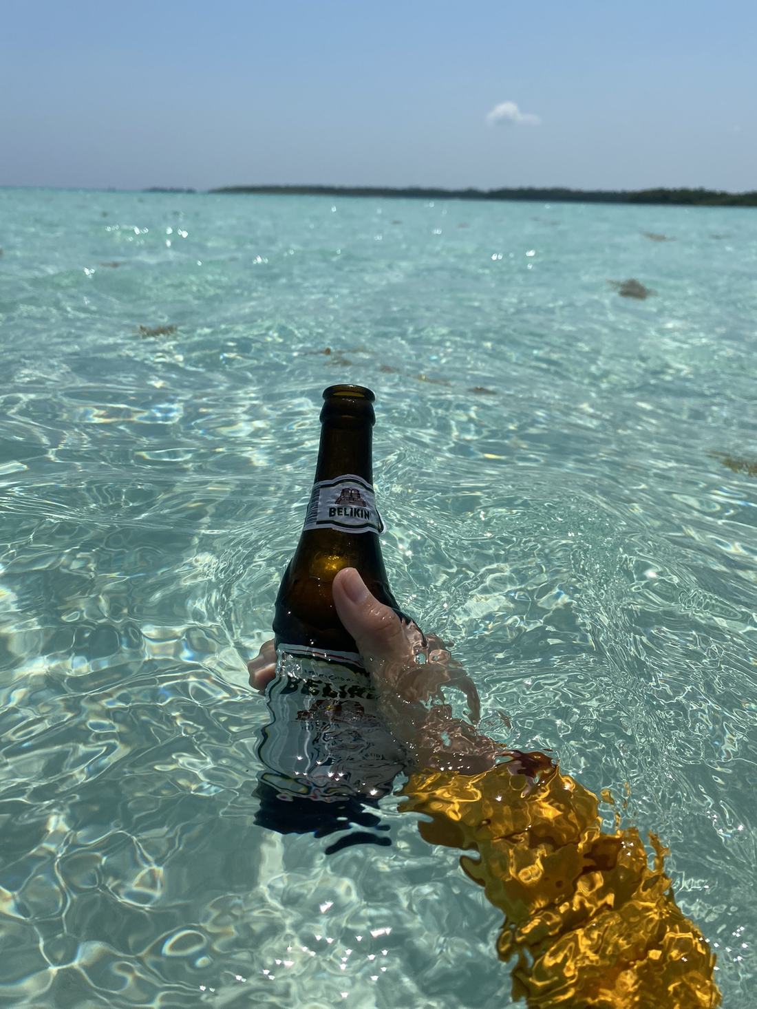 Belikin beer held up in clear flats water