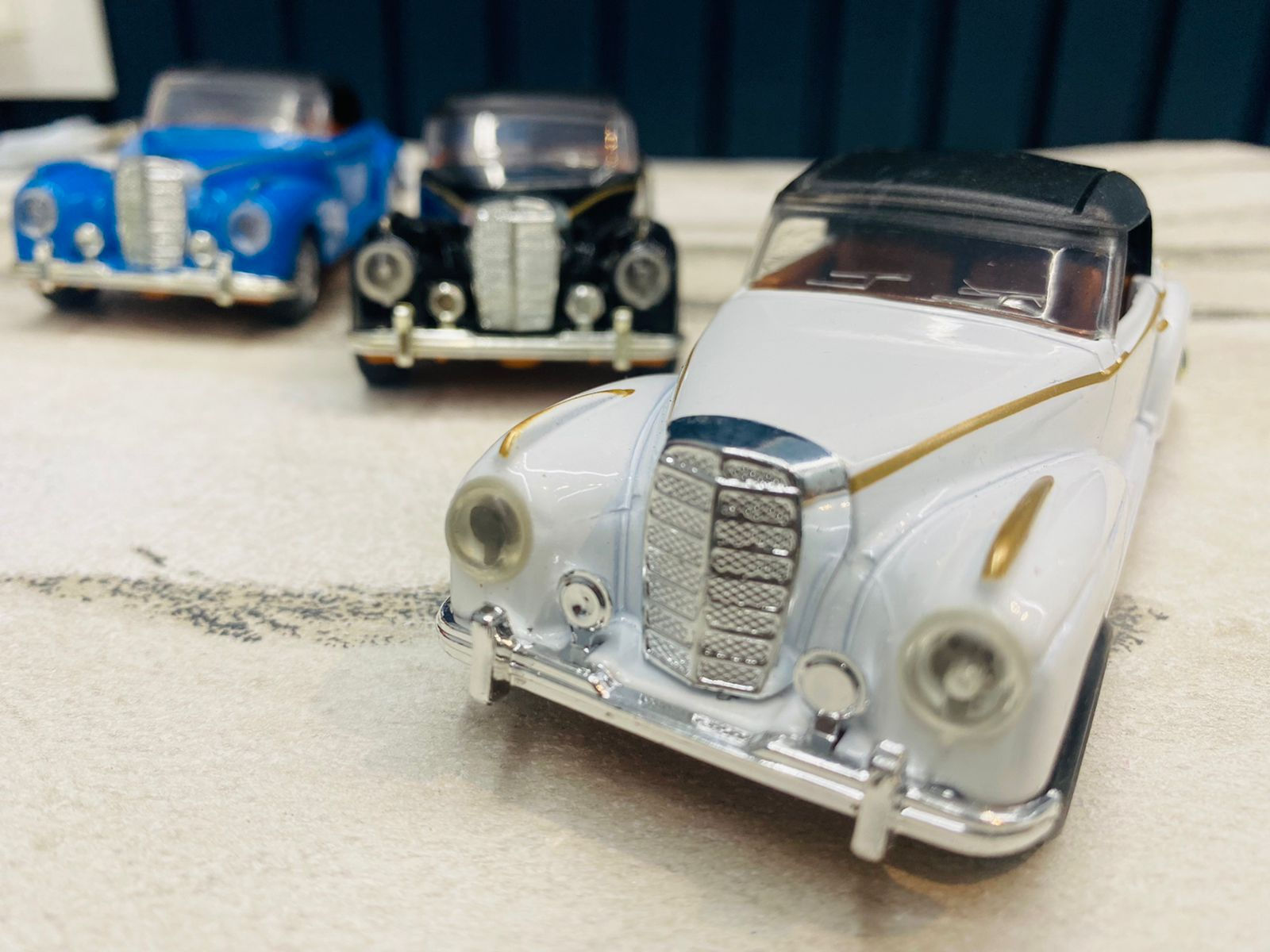 Desk Accessory: Hooded scale model of vintage cars