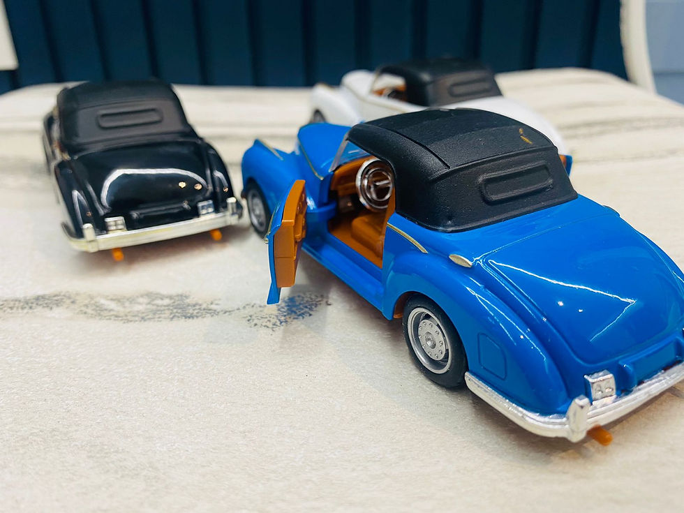 Thumbnail: Desk Accessory: Hooded scale model of vintage cars 