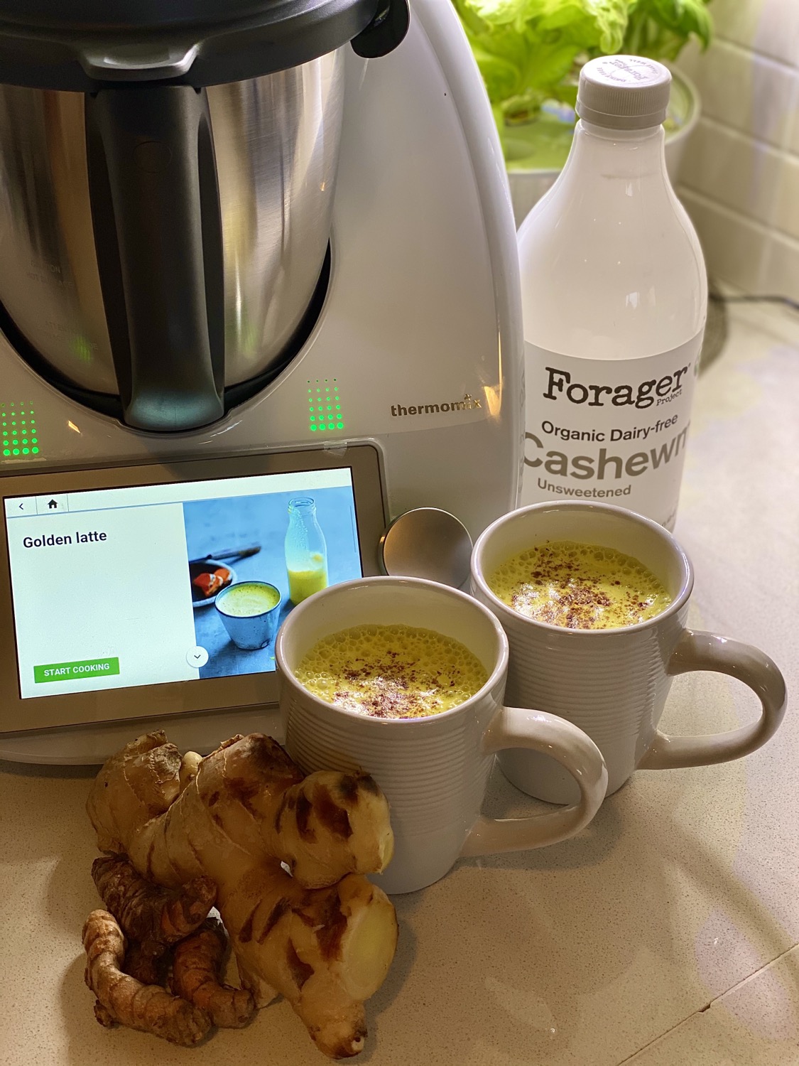 Turmeric Ginger Coconut Latte next to ingredients