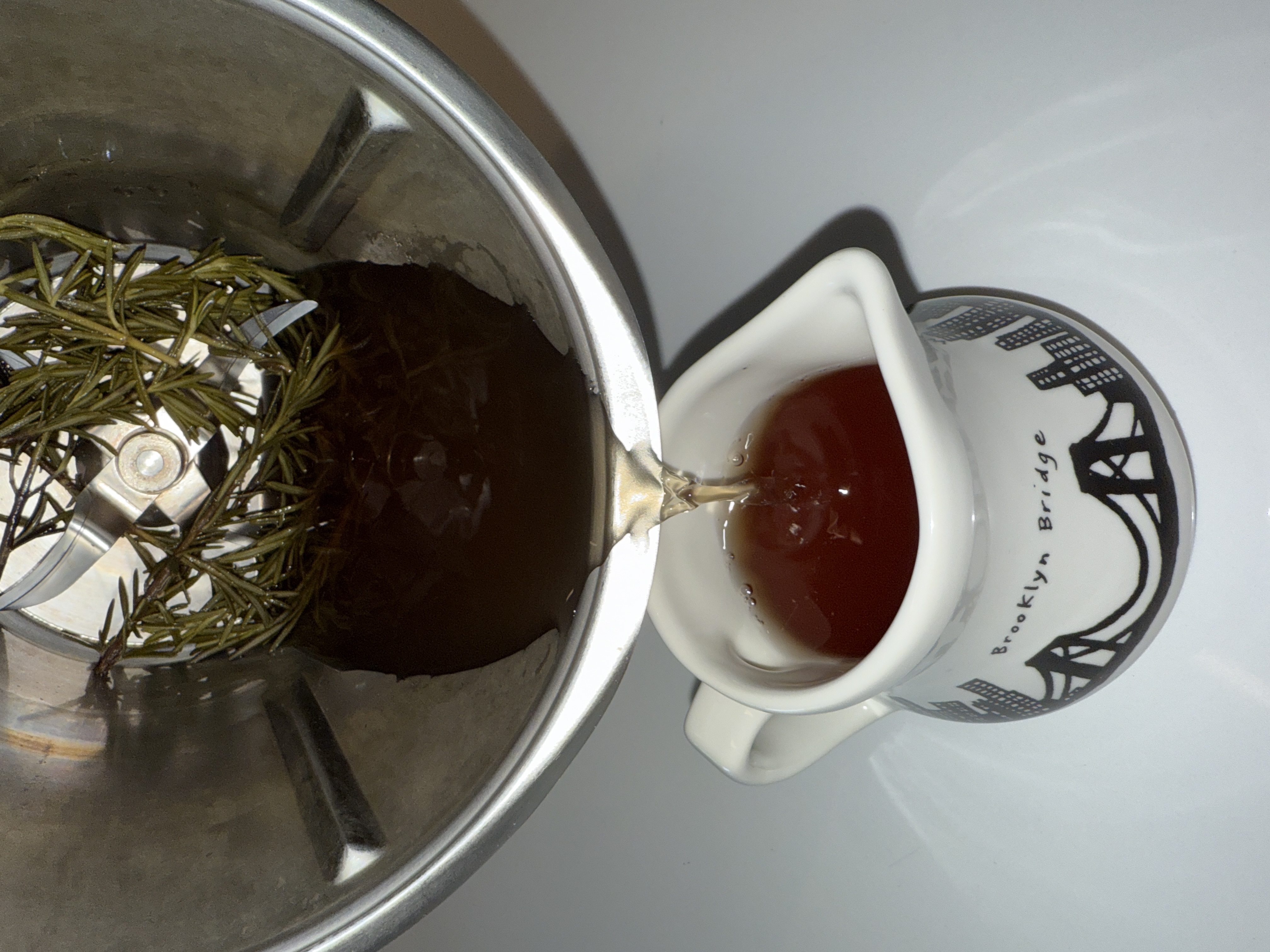 Making homemade rosemary water for hair growth