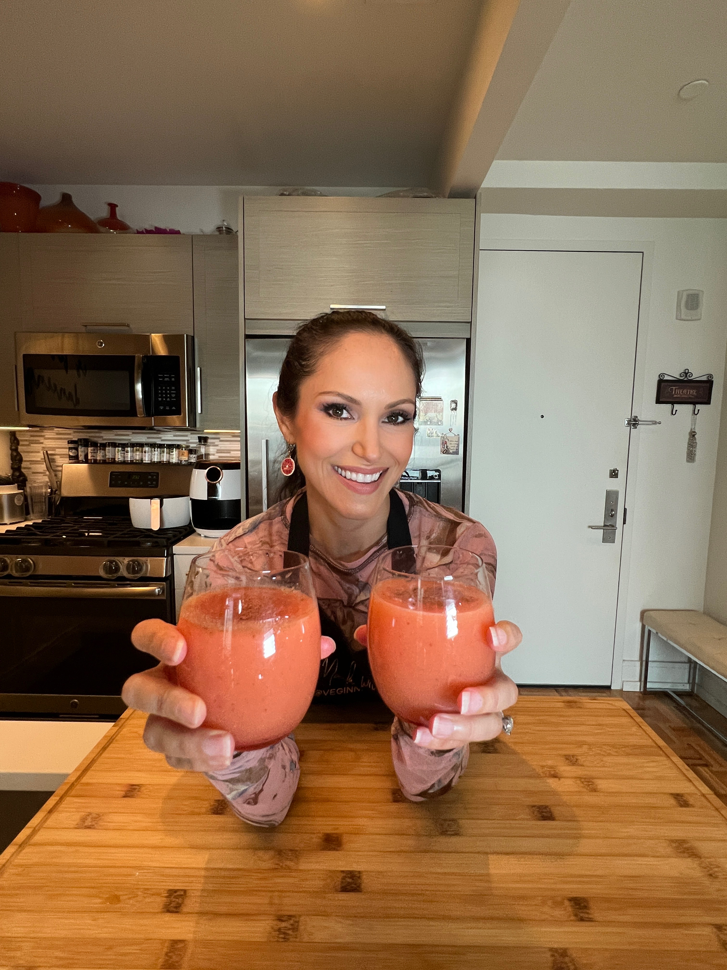 vegan chef holding mocktails