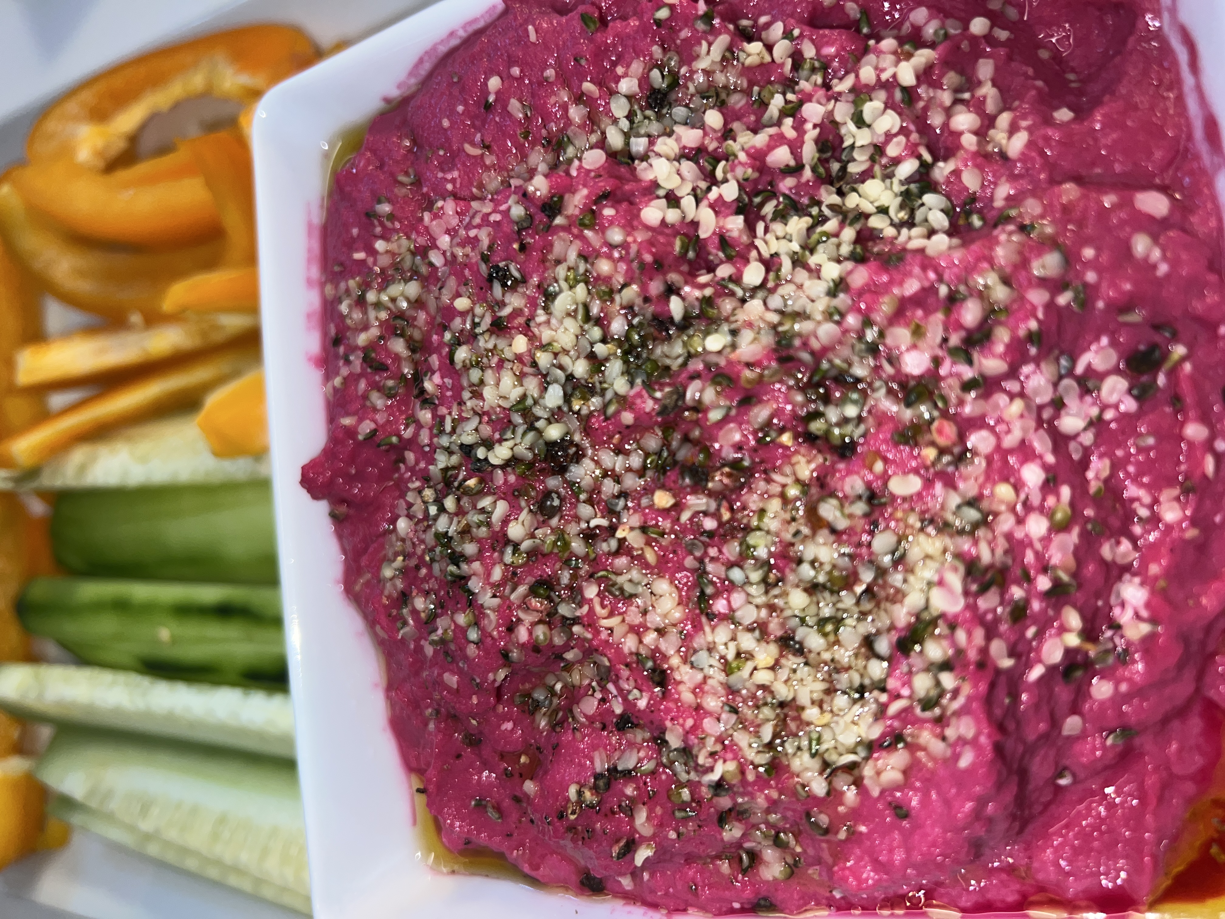 beet hummus with fresh veggie slices