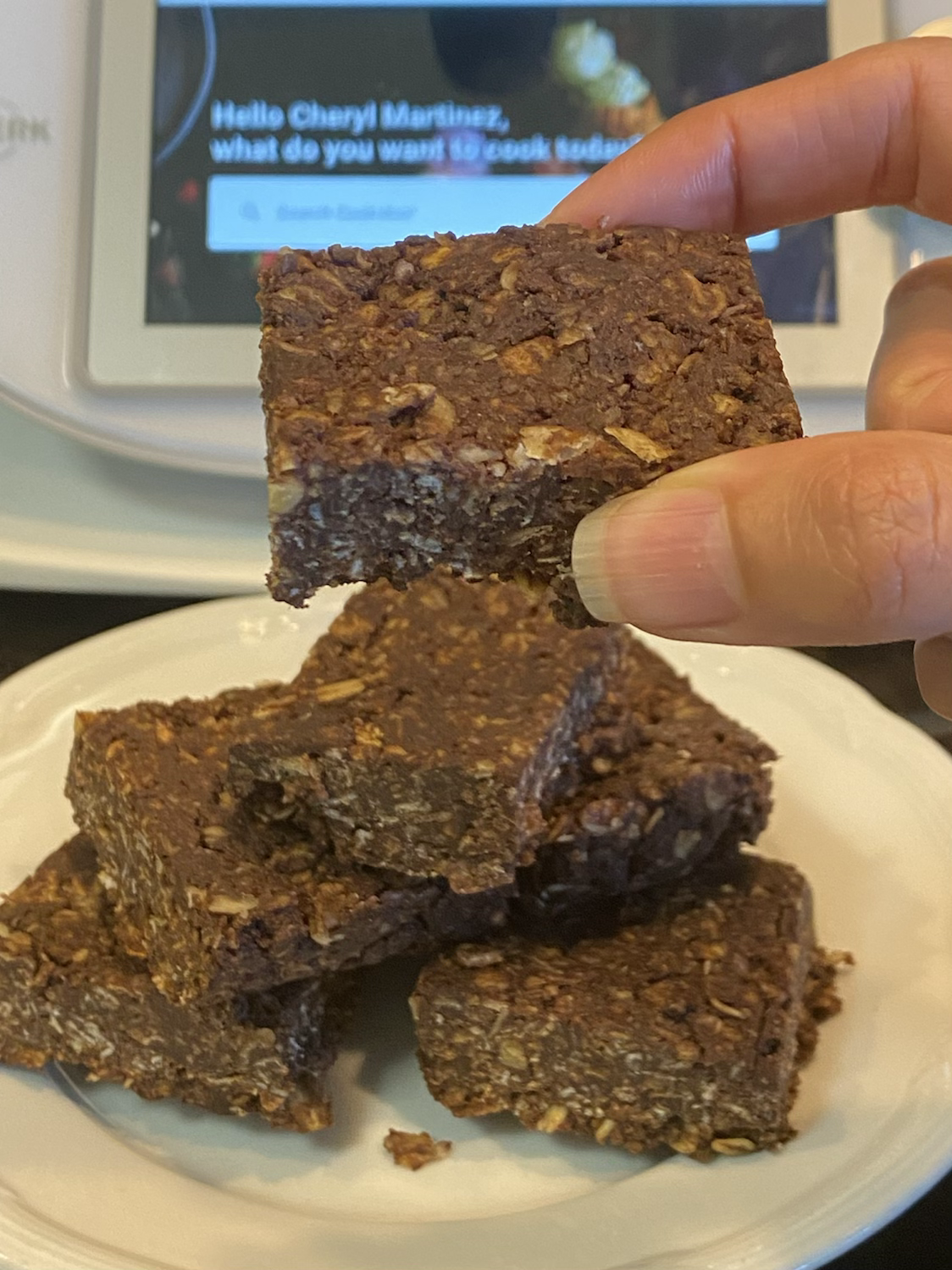 hand picking up Mint Chocolate Protein Bar