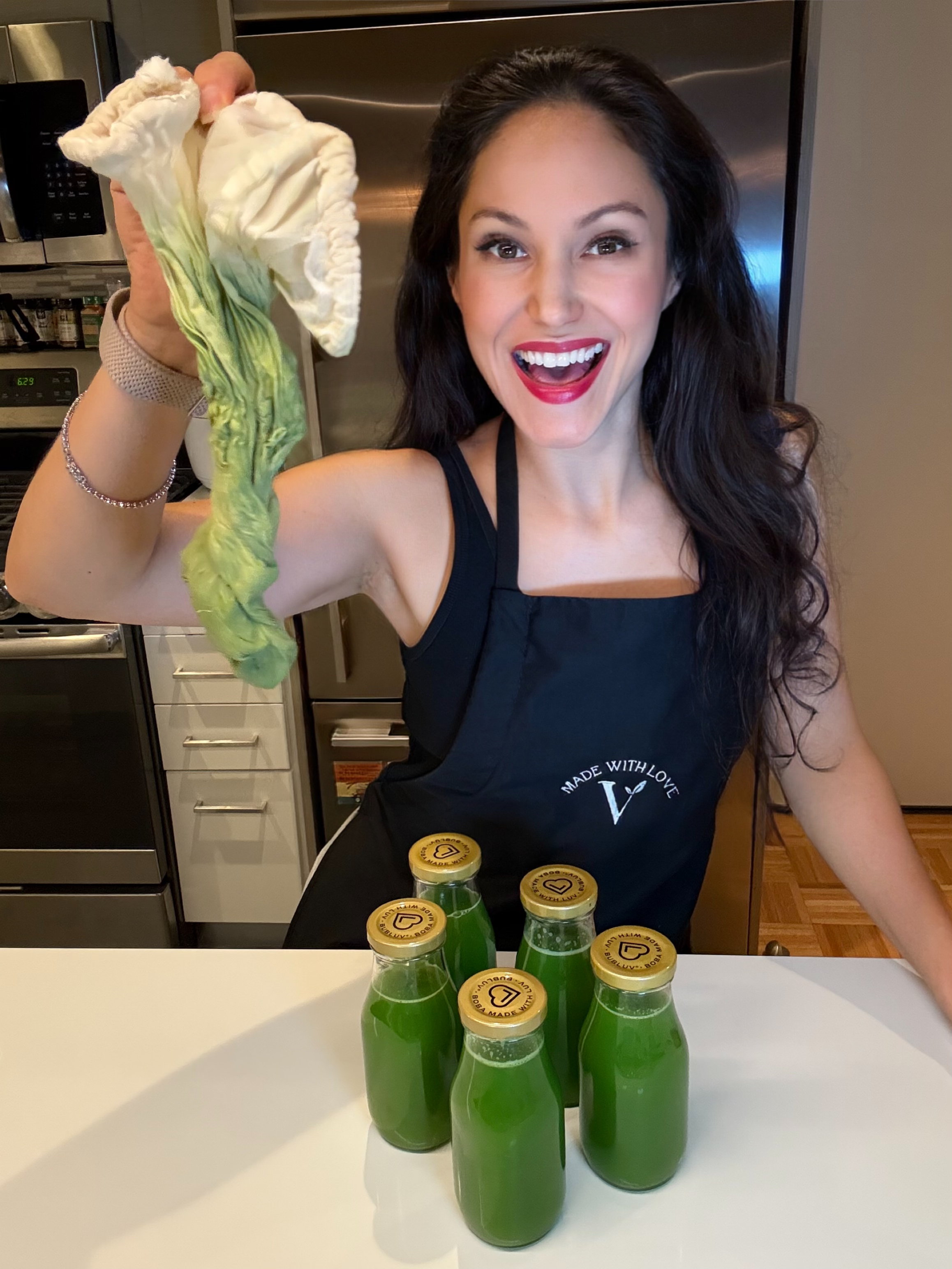 Cheryl Martinez making green juice