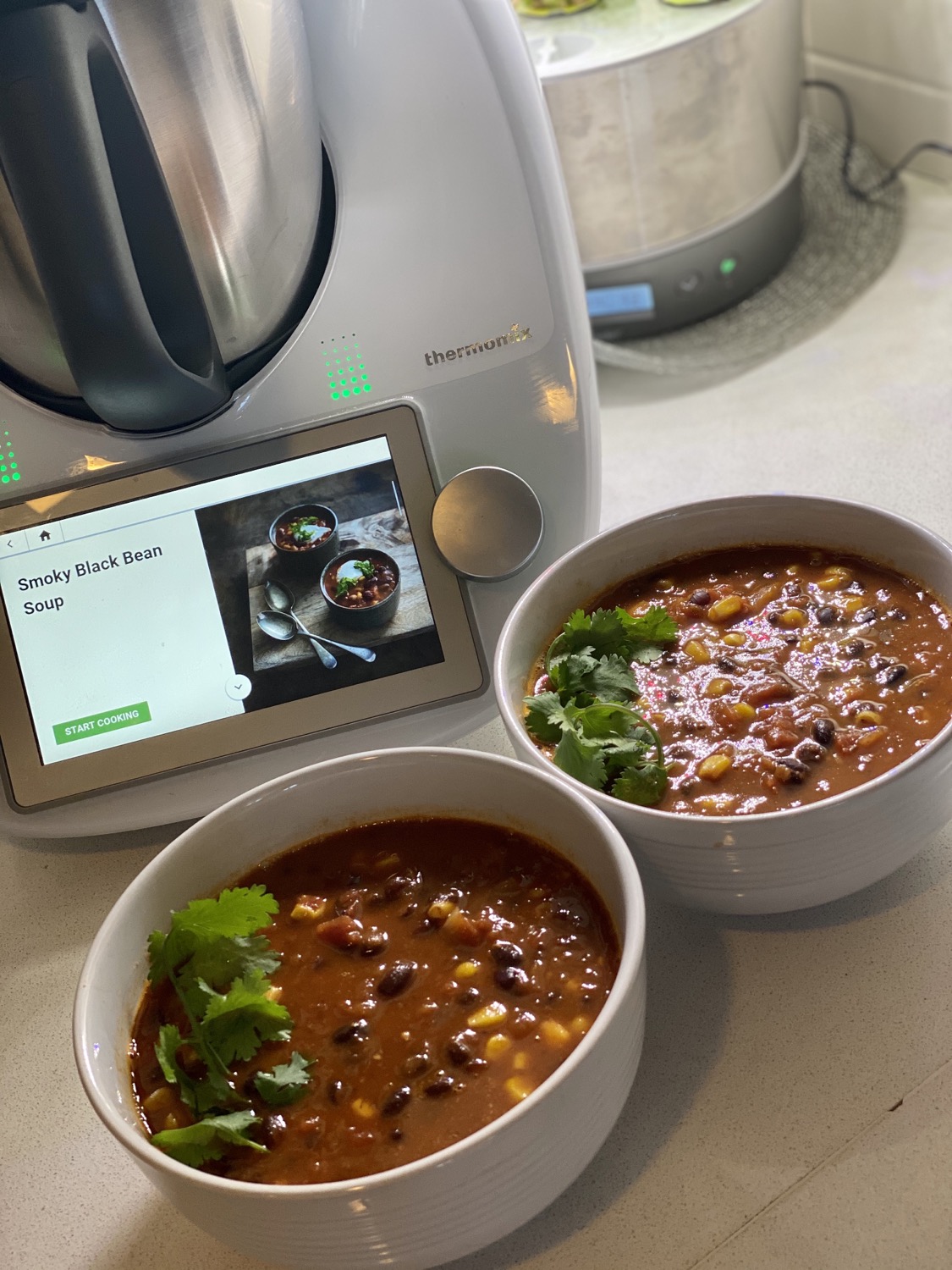 Mexican Black Bean Soup in bowls served on a table