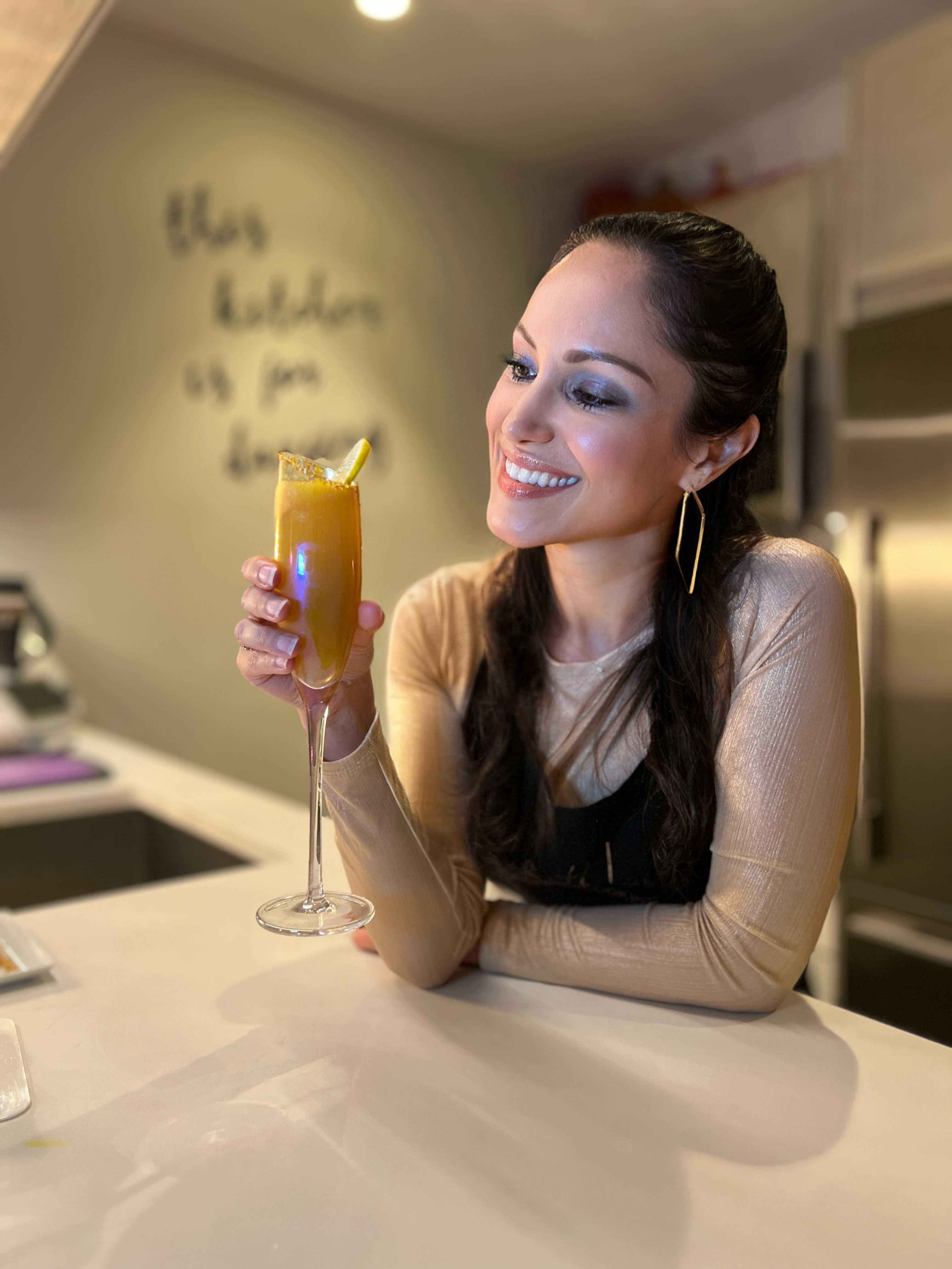 vegan influencer holding a mocktail