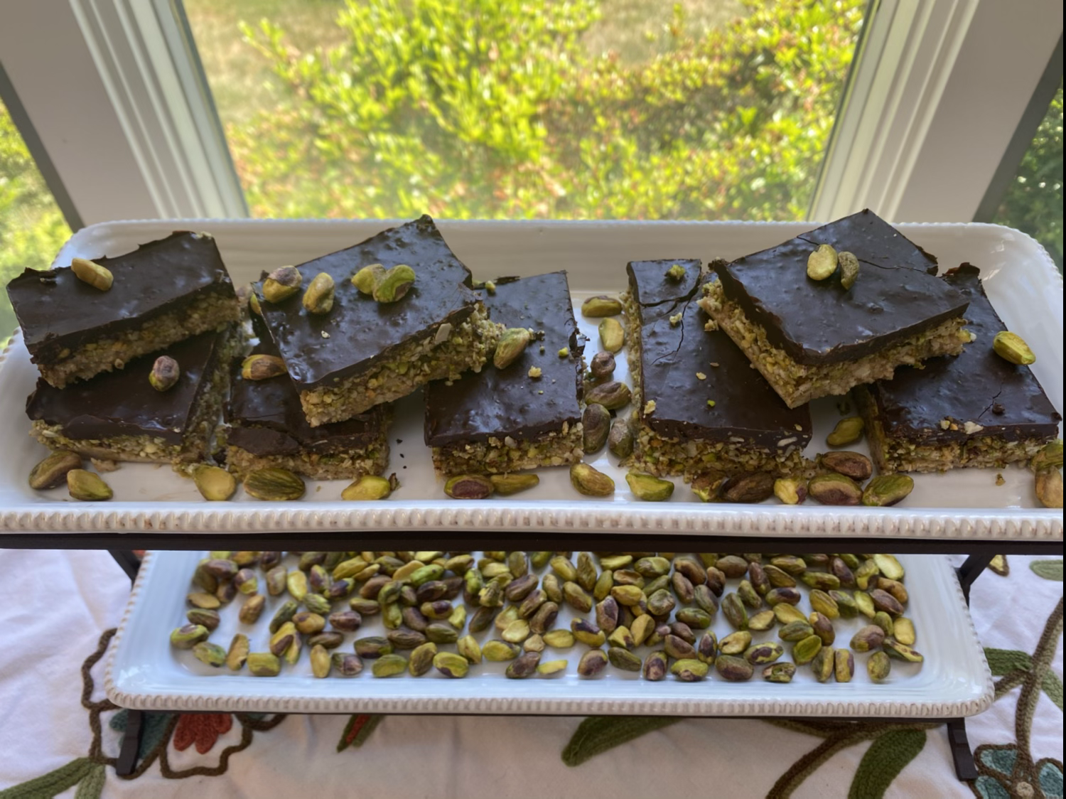 No-Bake Chocolate Bars with pistachios on a tray