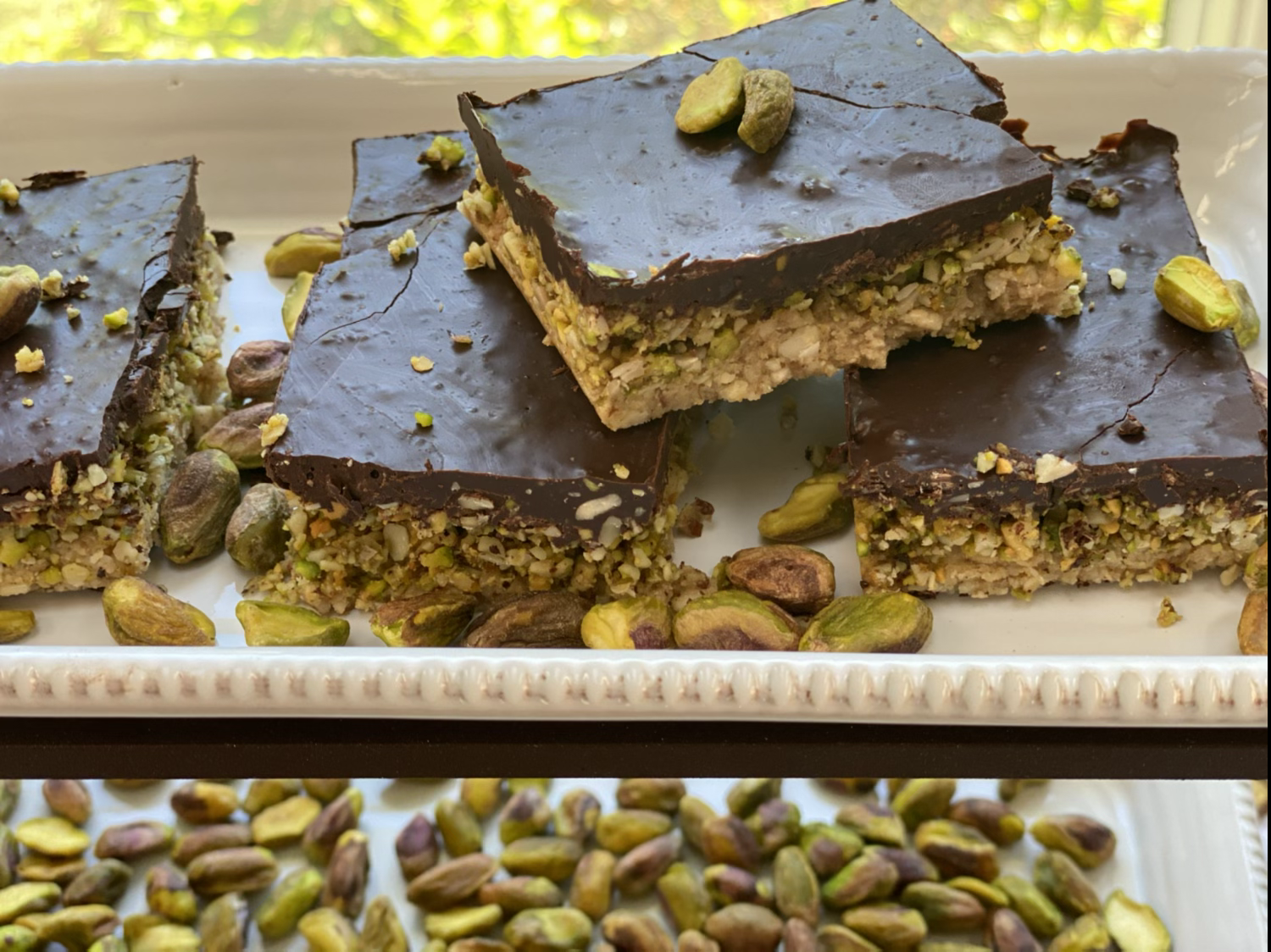 Vegan No-Bake Chocolate Pistachio Bars on tray