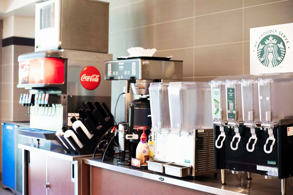 Station featuring soda machine