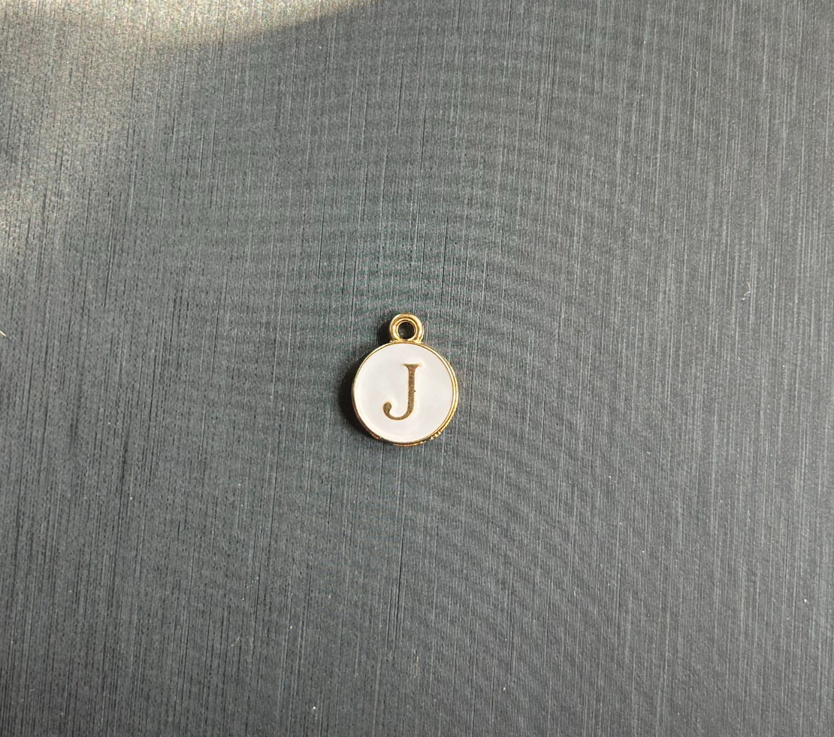 The White Circle "J" Charm