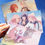 Thumbnail: three genshin impact postcards being held in the sky