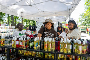 A group of women shopping different oils