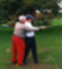 Moe Norman gives Todd Graves an on-range golf swing lesson