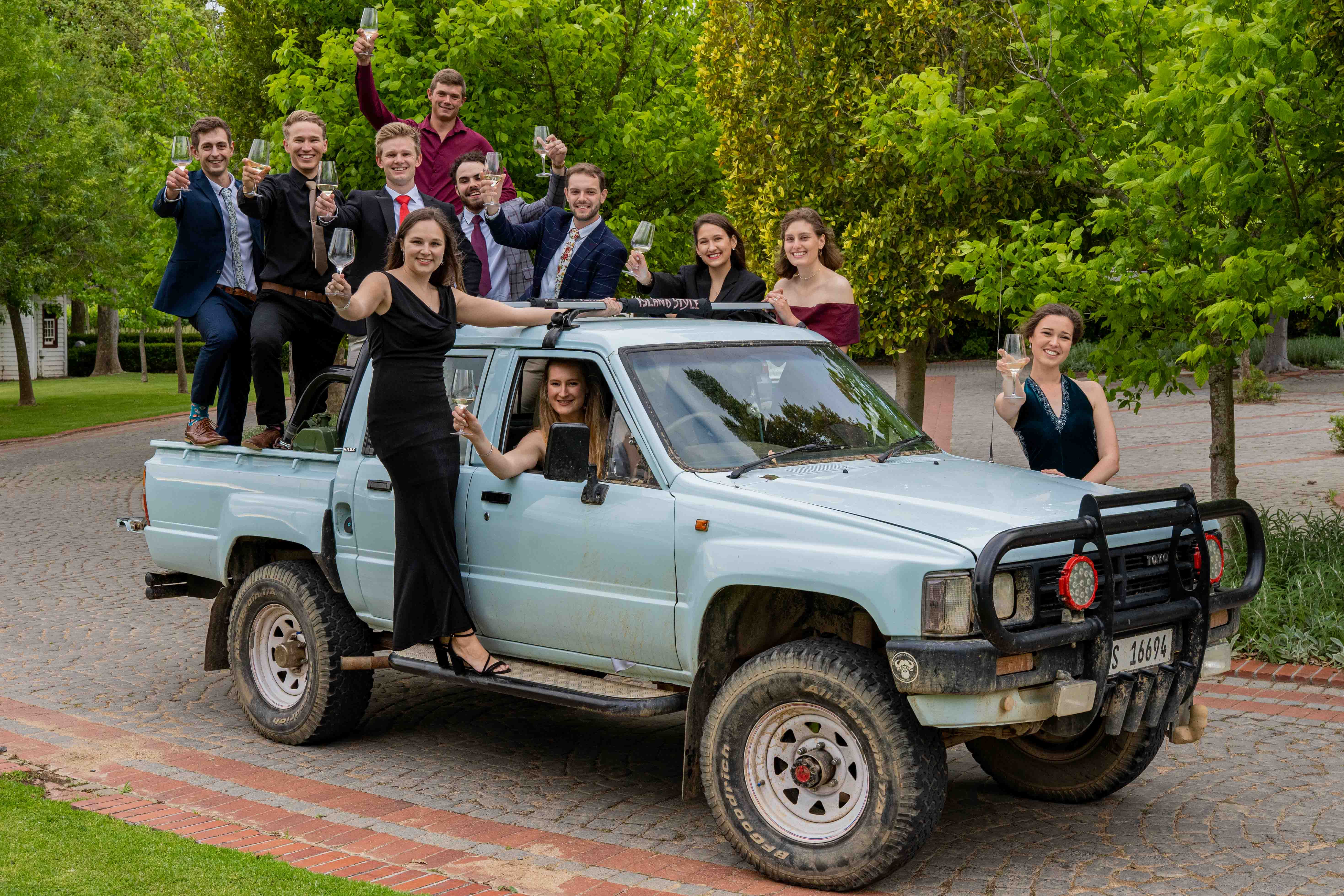 Photo taken at Students Formal Dance - young people on old bakkie