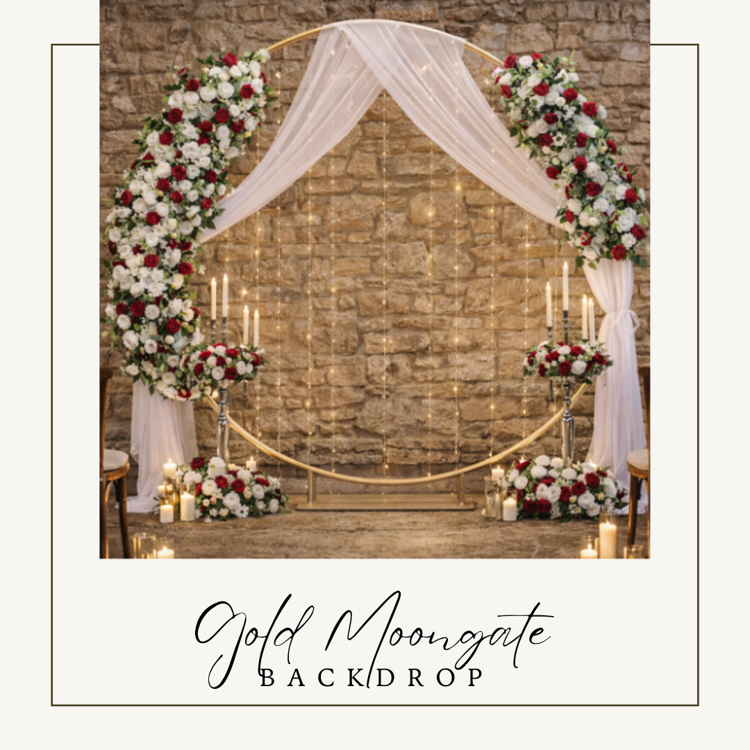 Gold moongate wedding backdrop with white drapes, burgundy and ivory floral arrangements and LED candles.