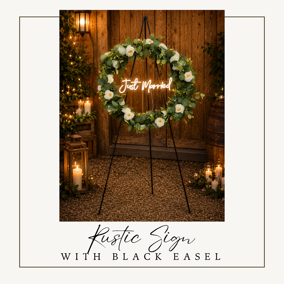 Rustic floral hoop sign with neon Just Married sign displayed on a black metal easel.