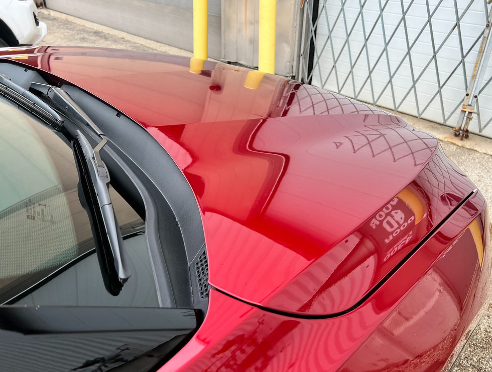 Chevy blazer with bright red paint cleared from pollen