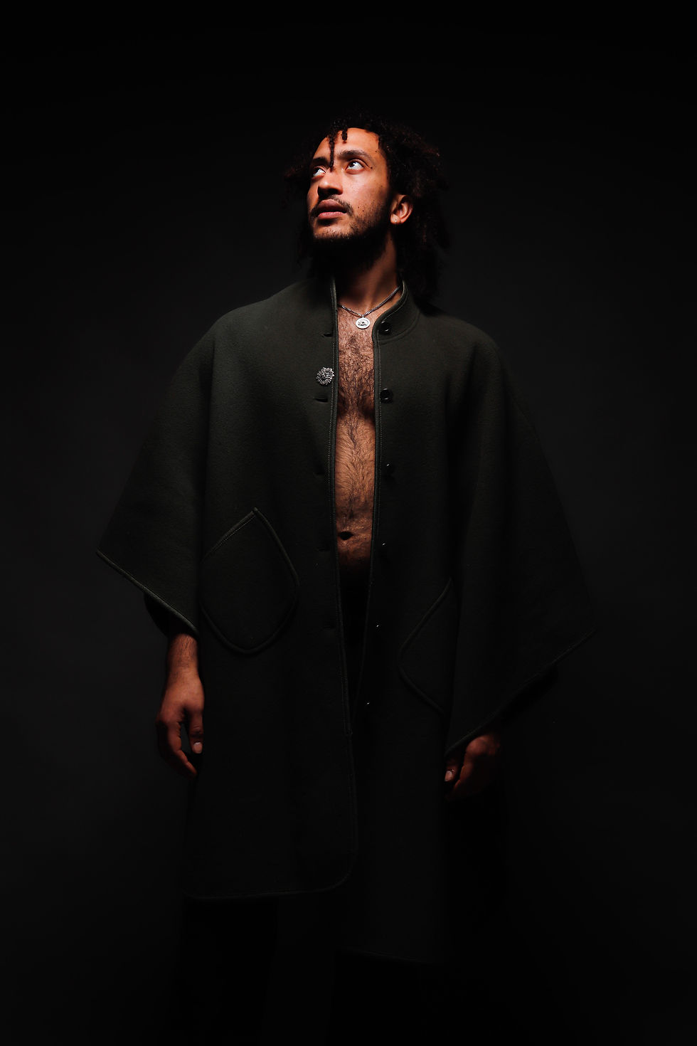 Portrait Photography capturing an editorial style of a man, fashion photography.