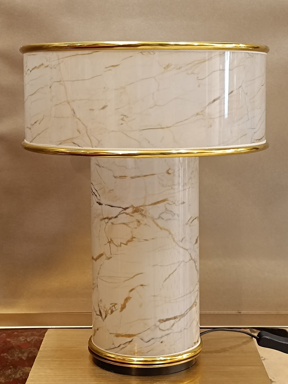 Thumbnail: Elegant gold-striped lamp with marble pattern shade