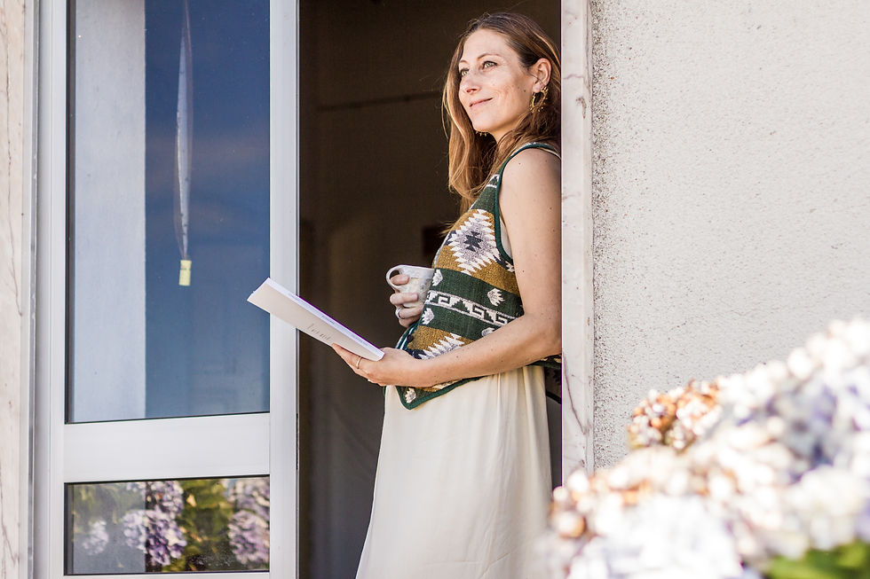 Iris Berghs standing at the door of her ruin